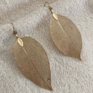 Delicate gold tone dipped leaf earrings
